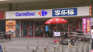 CARREFOUR Carrefour lascia la Cina