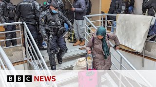 Paris police evict hundreds of migrants from camp ahead of Olympics | BBC News