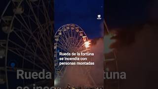 FORTUNA Rueda de la fortuna se incendia con varias personas montadas