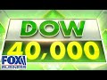 NEW MILESTONE: Dow hits 40,000 for first time