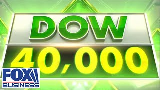 DOW JONES INDUSTRIAL AVERAGE NEW MILESTONE: Dow hits 40,000 for first time