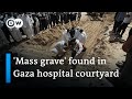Exhumation operations continue at apparent mass grave in Khan Younis | DW News