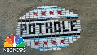 MOSAIC COMPANY THE Artist Transforms Potholes Into Mosaic Pieces