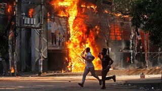 At least 30 killed as violent protests rock Bangladesh