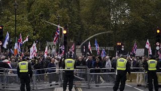 RALLY Supporters of far-right British figure rally as anti-racism demonstrators mount counter-protest