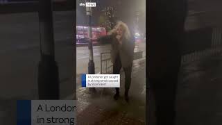 UMBRELLA Woman loses umbrella to Storm Bert