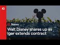 Walt Disney shares up as Iger signs extended contract