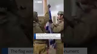 Israeli soldiers raise flag in Lebanon