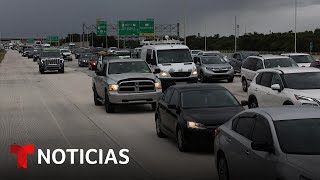 Unos protegen sus casas y otros huyen por carretera de donde se cree que pasará el huracán Milton