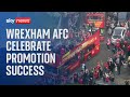 AFC ENERGY ORD 0.1P - Watch live: Wrexham AFC celebrate promotion success with bus parade