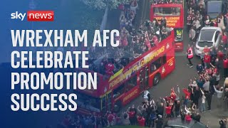 AFC ENERGY ORD 0.1P Watch live: Wrexham AFC celebrate promotion success with bus parade