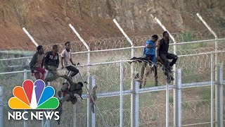 ENCE Hundreds Of Migrants Claim ‘Victory’ After Storming Border ence | NBC News