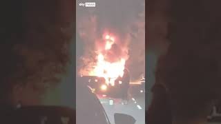 ROAD Bus engulfed by flames blocks main road in Wales