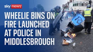 UK riots: Wheelie bins on fire launched at police in Middlesbrough
