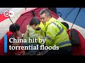 How China's government is tackling 'once in a century' rainfall | DW News