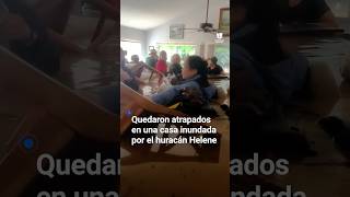 Estas personas quedaron atrapadas en una casa inundada por el huracán Helene