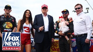 Trump gets roaring reception at NASCAR race