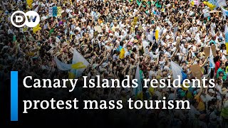MASS Protesters demand changes to mass tourism in Spain | DW News