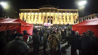 RALLY Georgian protesters rally in Tbilisi ahead of first session of newly-elected parliament