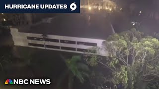 Debris swirls through air, storm surge rises in Sarasota