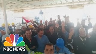 SUEZ Dredging Crew Celebrates Successful Suez Refloating Operation | NBC News NOW