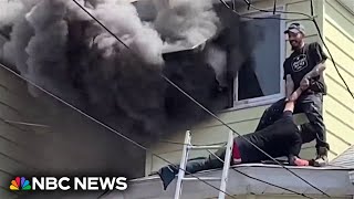 Man rescues neighbors from burning home