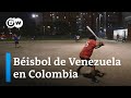 Migrantes venezolanos dan un impulso al béisbol de Colombia