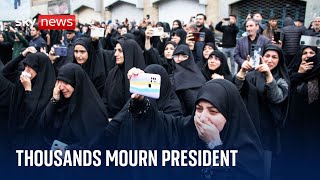 Thousands mourn Iran&#39;s president and others celebrate his death