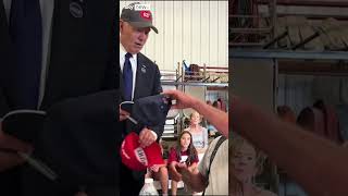 JOE Joe Biden swaps hats with Trump supporter