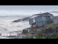 Houses washed into sea as Storm Fiona batters Canada - BBC News