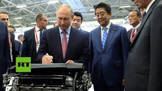 MAZDA MOTOR CORP. MZDAY Putin y Abe visitan una fábrica de Mazda en Rusia