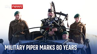 GOLD - USD D-Day: Military piper marks 80 years since moment UK personnel landed on Gold Beach