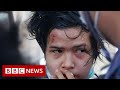 Myanmar police fire rubber bullets as protesters defy ban - BBC News