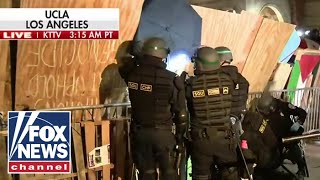 Law enforcement at UCLA move in on anti-Israel encampment