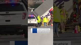 FEDEX CORP. FedEx truck hangs off bridge in New York following crash