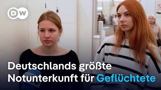 5000 Menschen leben in Deutschlands größter Notunterkunft für Geflüchtete | DW News