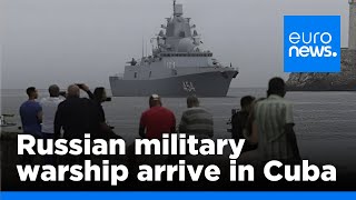 Cubans line up in Havana to board Russian military warship