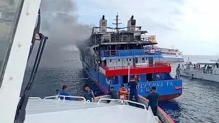 568 people survive after an Indonesian passenger ferry caught fire at sea, killing 3