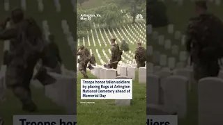 Troops place flags at Arlington ahead of Memorial Day