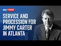 Mourners gather in Atlanta for a service for Jimmy Carter