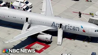 AMERICAN AIRLINES GRP Smoke fills American Airlines flight in San Francisco