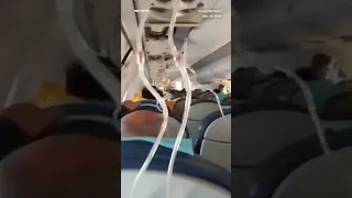 Passengers on an Azerbaijan Airlines were seen wearing masks in the cabin before the plane crashed.