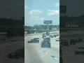 Wild moment caught on cam of a car being towed with only a chain swerves out of control on a freeway