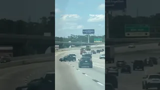 INDEX CHAIN Wild moment caught on cam of a car being towed with only a chain swerves out of control on a freeway