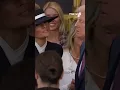 Trump's cheek kiss is blocked by Melania's hat