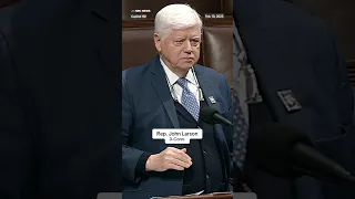 Rep. John Larson freezes after having a medical episode on the House floor.