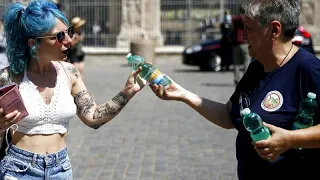 Italy and Spain bake in heatwave as cities issue red alerts and regions mull work bans