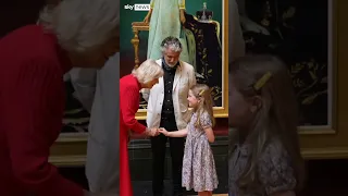 The King and Queen unveil royal portraits