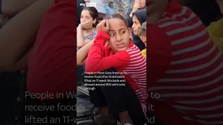 Palestinians line up for food in Gaza