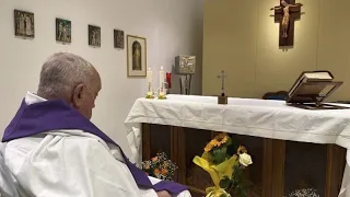 Vatican release photograph of Pope Francis celebrating Mass in hospital chapel